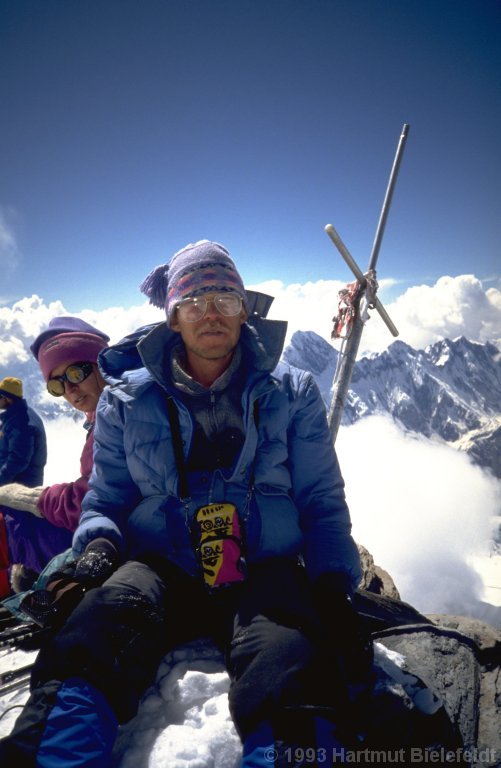 the summit cross is improvised out of tent poles.
