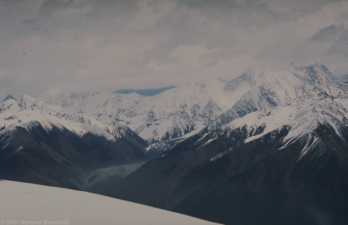 The first view of our mountain is cloudy. Our basecamp shall be a little left of the image center.