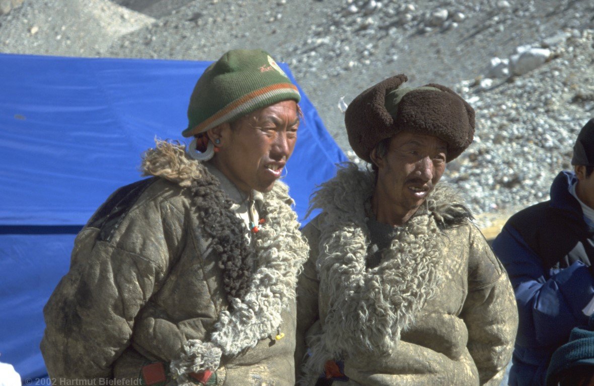 The yak herders are waiting for their job