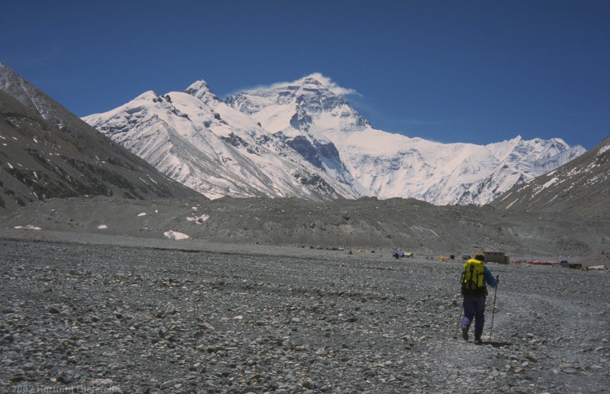 We go ahead through a barren scree landscape