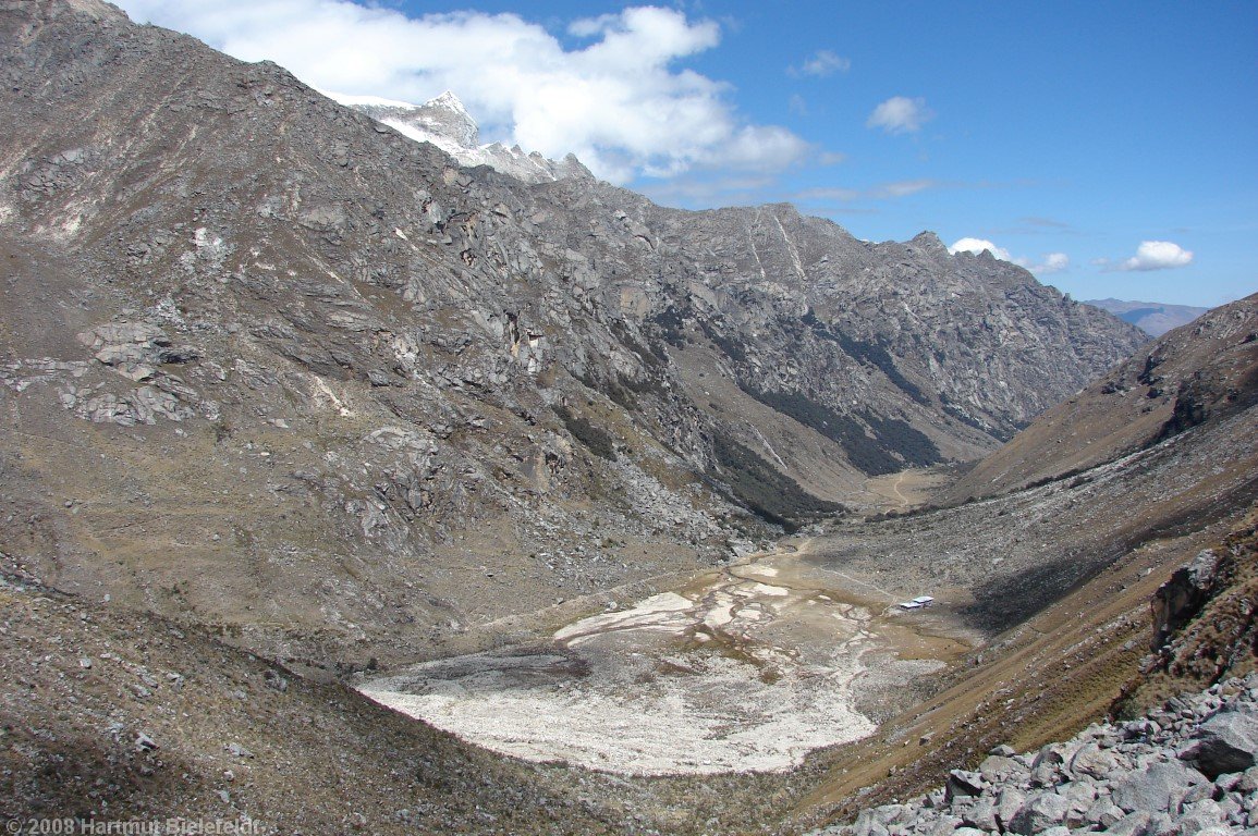 On the way to high camp, in the valley floor Refugio Ishinca (right) and basecamp area (left side)