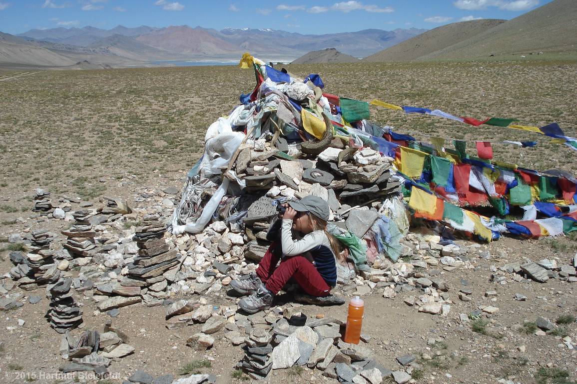 Nina views the summiteers returning.