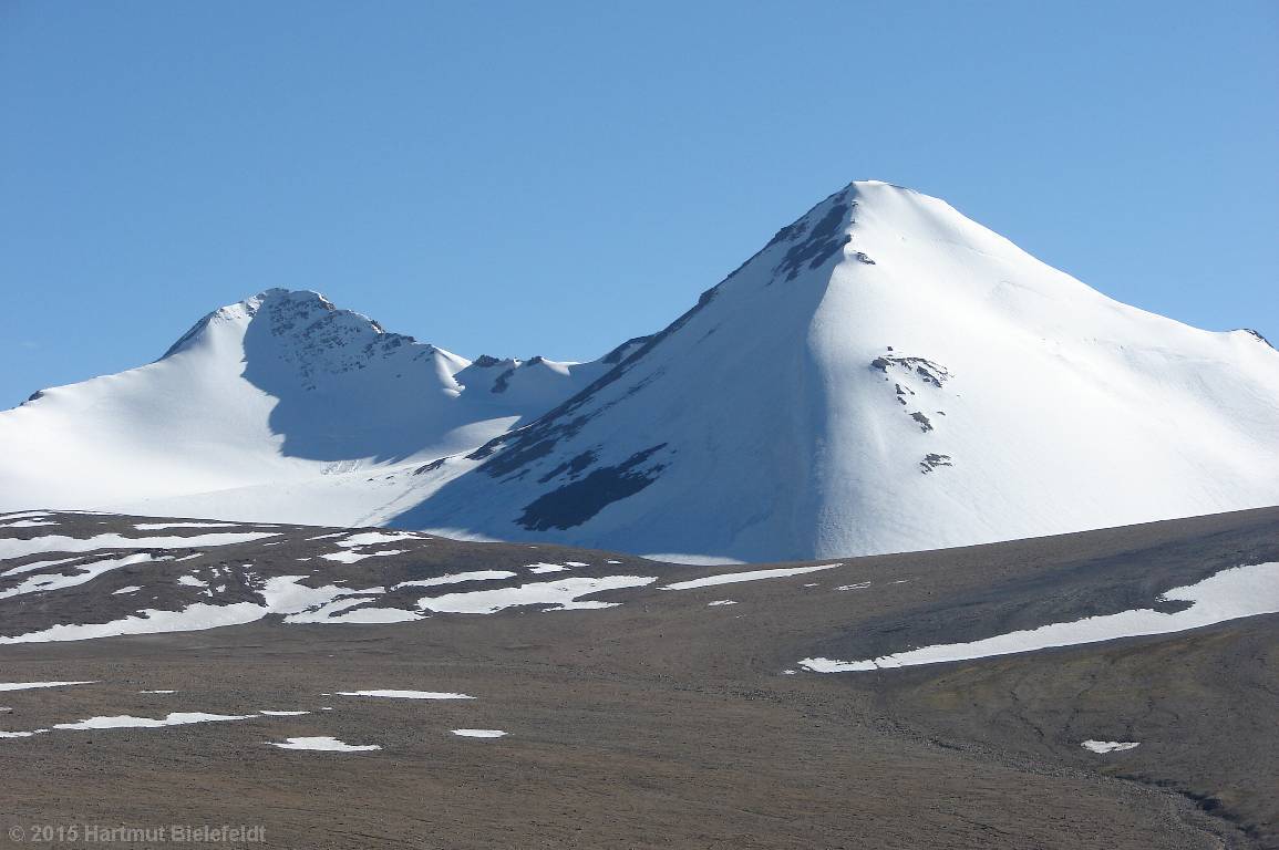 Pyramid and its left side neightbour, probably almost same height