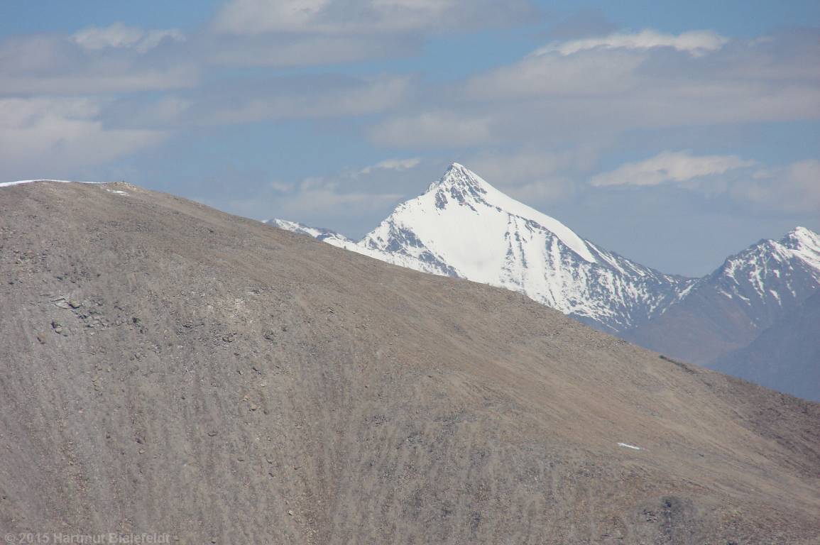 An about 6400 m high mountain in the border area